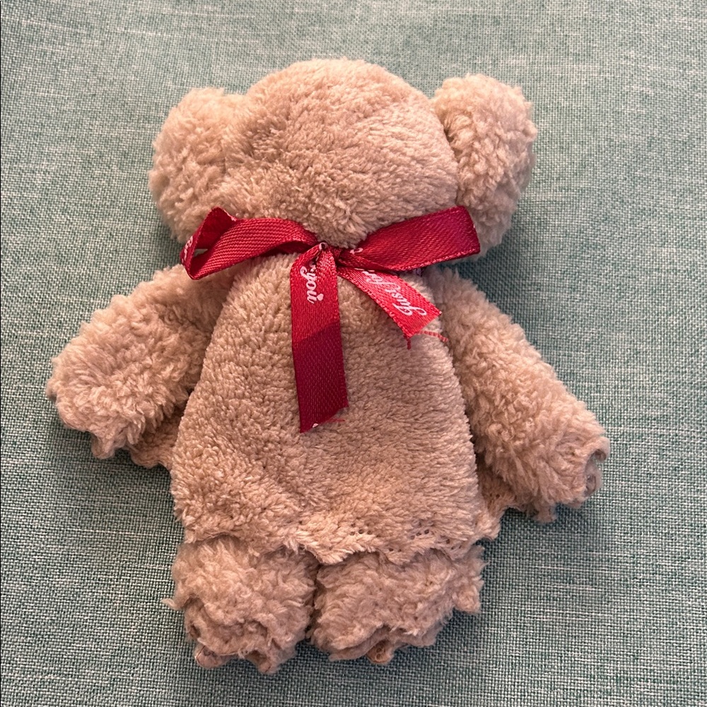 Plush Teddy Bear with Red Bow